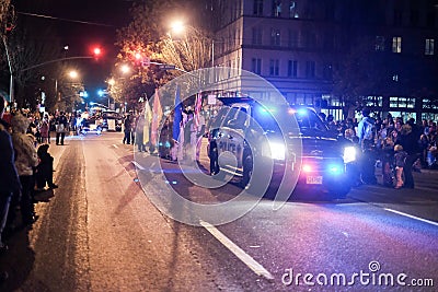 Police car and Boy Scout troop lead holiday parade in Oregon Editorial Stock Photo