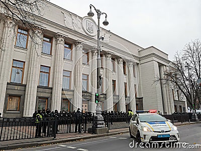 A police car guards public safety near the building of the Verkhovna Rada of Ukraine Editorial Stock Photo