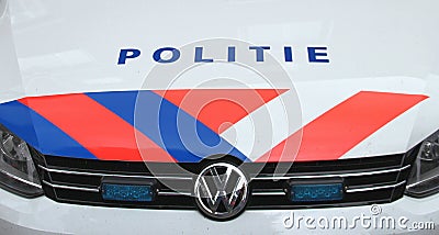 Police car in the Netherlands with logo, Politie text on front and sign STOP Editorial Stock Photo
