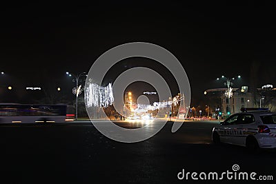 Police car watching night traffic Editorial Stock Photo