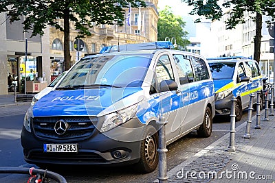 police cars on streets of germany, law enforcement officers guarding order on vehicles, patrolling, sending law enforcement Editorial Stock Photo