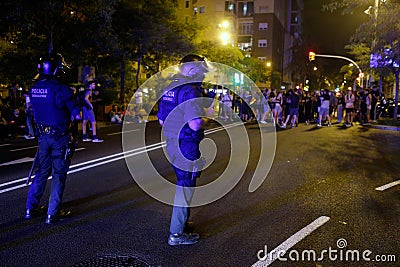 Police and demonstrators take the streets of Barcelona Editorial Stock Photo