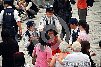 Police detaining man Editorial Stock Photo