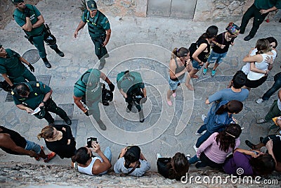 Police evicts a group protesting against a bull run celebration. Editorial Stock Photo