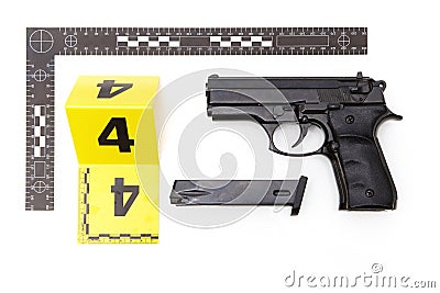 Evidence of handgun with magazine from crime scene Stock Photo