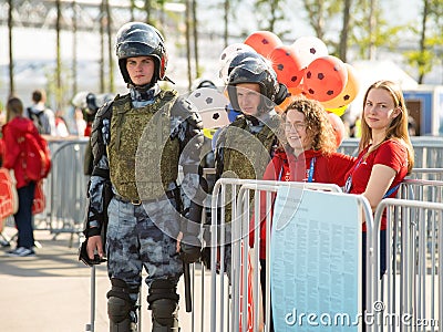 Police guards and volunteer at entrance in world cup match on Kr Editorial Stock Photo