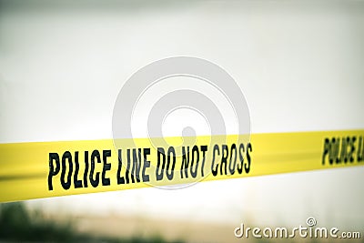 Police line do not cross protect crime scene Stock Photo