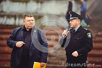 Police officer gives an interview Editorial Stock Photo