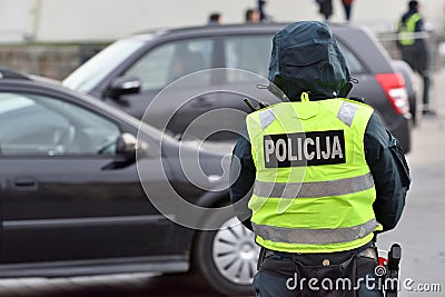 Police officer managing road traffic Stock Photo