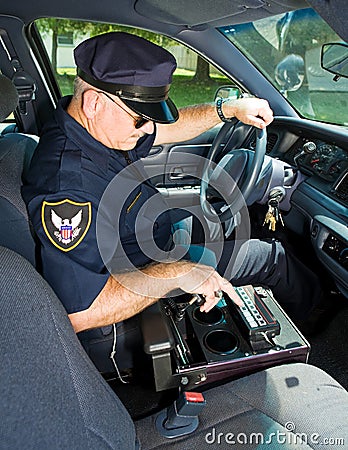 Police Officer With Siren Stock Photo