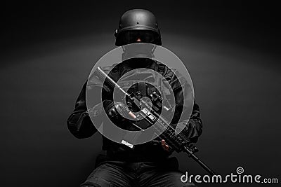 Police officer with weapons Stock Photo