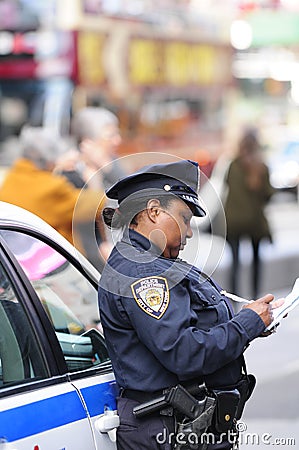 Police officer writing citation Editorial Stock Photo