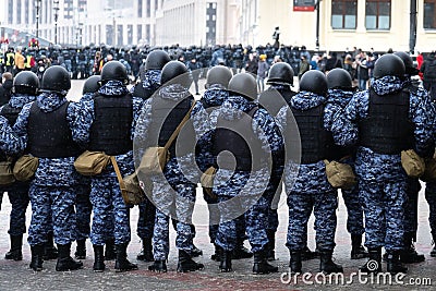 Police officers stand in a cordon on political rally in support of the arrested opposition leader Alexei Navalny Editorial Stock Photo