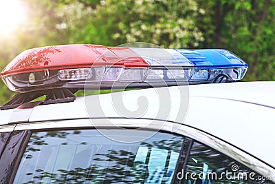 Police patrol car with sirens off during a traffic control. Blue Stock Photo