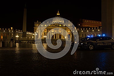 Rome, Italy - May 31, 2018: Police patrol guards St. Peter`s Square and the St. Peter`s Basilica at night Editorial Stock Photo