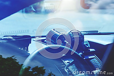 Police radar inside of police car. Patrol monitors traffic on a Stock Photo