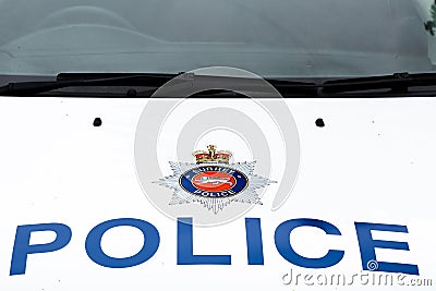 Police sign on top of Surrey Police car hood Editorial Stock Photo