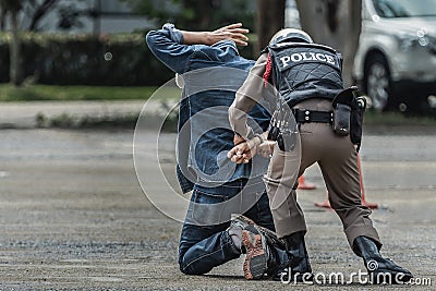 Police steel handcuffs,Police arrested,Police arrested the wrongdoer. Stock Photo