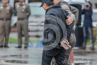Police steel handcuffs,Police arrested,Police arrested the wrongdoer. Editorial Stock Photo