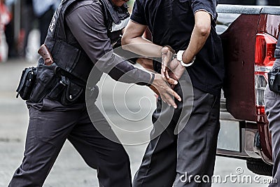 Police steel handcuffs,Police arrested. Editorial Stock Photo