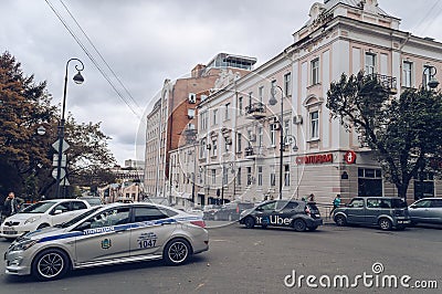 police and taxi cars on the streets of Vladivostok Editorial Stock Photo