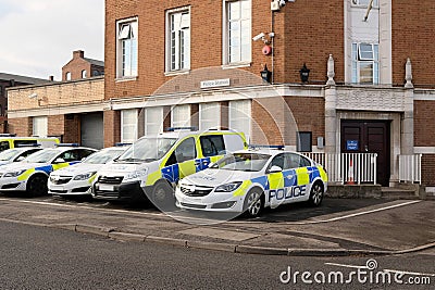 Police vehicles outside the Police station, UK Stock Photo