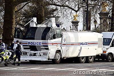 Police water cannon on The Streets of Paris. Paris, France, March 29, 2023. Editorial Stock Photo