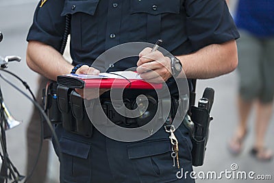 Police writes ticket Stock Photo