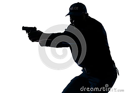 Policeman aiming a handgun Stock Photo