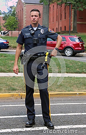 Policeman On Duty During An Event Editorial Stock Photo