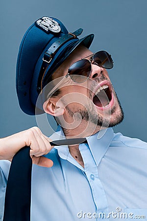 Policeman had enough of his job Stock Photo