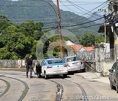 Policeman at a Shootout in a Favela in Rio De Janeiro Editorial Stock Photo