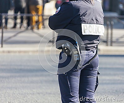 Policeman on a street in Paris controls public order Stock Photo