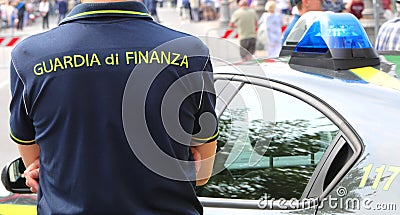 Policeman with uniform and text GUARDIA DI FINANZA Editorial Stock Photo