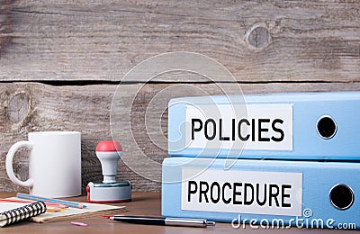 Policies and Procedure. Two binders on desk in the office. Business background Stock Photo