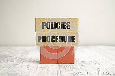 policies procedure words on wooden blocks and white background Stock Photo