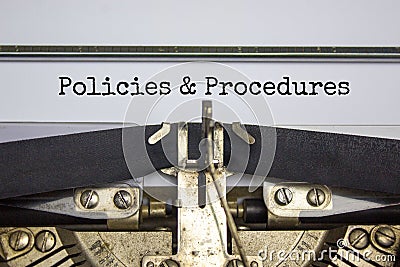 Policies and procedures symbol. Words `Policies and procedures` typed on retro typewriter. Business and policies and procedures Stock Photo