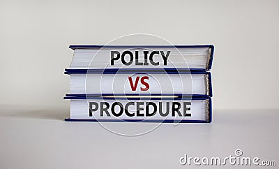 Policy vs procedure symbol. Books with words `Policy vs procedure` on beautiful white table, white background. Business and poli Stock Photo