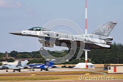 Polish Air Force Tiger Demo Team special livery Lockheed Martin F-16C Fighting Falcon 4052 aircraft arrival and landing for RIAT Editorial Stock Photo