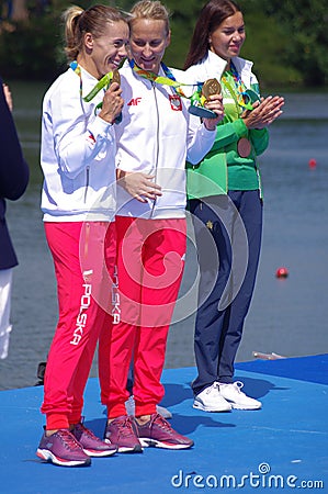 Polish Magdalena Fularczyk-Kozlowska and Natalia Madaj with Olympic gold medals Editorial Stock Photo