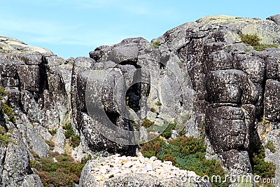 Polished black rocks near Covao do Boi, Portugal Stock Photo