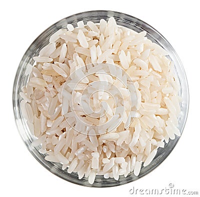 Polished long rice heap in glass bowl Stock Photo