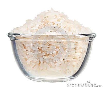 Polished long rice heap in small glass bowl Stock Photo