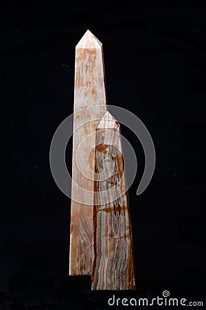 Polished multicolor carved onyx obelisk Stock Photo