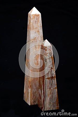 Polished multicolor carved onyx obelisk Stock Photo