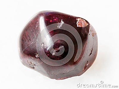 polished red garnet gemstone on white Stock Photo