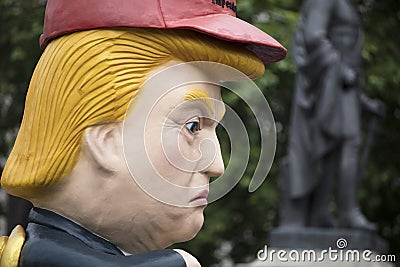 A political satire sculpture of Donald Trump at an anti Trump March in London Editorial Stock Photo