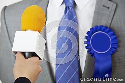 Politician Being Interviewed By Journalist During Election Stock Photo