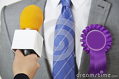 Politician Being Interviewed By Journalist During Election Stock Photo