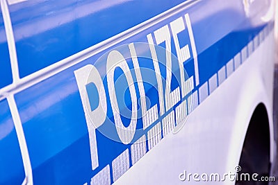 German word Polizei on a German police car Stock Photo